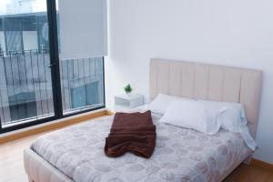 Hermoso Departamento con Piscina en Edificio EPIQ