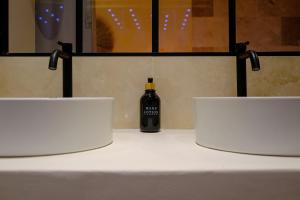 Appartements AMA, suite avec baignoire balneo et sauna prive : photos des chambres