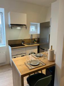 Appartements Au fil de l-eau, Gare, Wifi, TV, Parking : photos des chambres