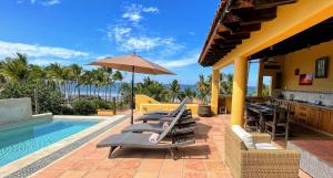 Twenty Steps from Litibu Beach at this Hideaway