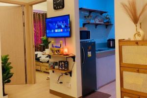 2 BR condo trees residences Netflix Games karaoke