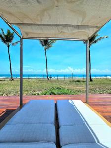 Sofisticação e Luxo à Beira-mar com Piscina Privativa no Cais Eco by HM