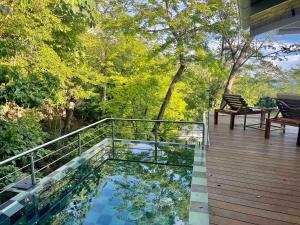 Casa AguasPoolYoga deckwalk to Surf Point