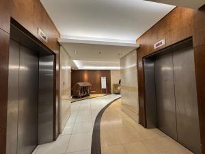 Grand Riviera Suites 1202 front of US Embassy by Prime Stay