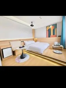 Orange Huaju Hotel - Deyang