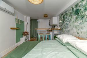 Appartements Le Jardin Secret - Centre ville - WIFI - by CLE HOTES : photos des chambres