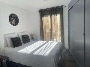 Appartements place Peyramale : photos des chambres