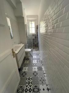 Appartements Noir et Blanc : photos des chambres