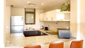 Ollystays Tawila 3BR Townhouse Shared Pool