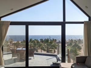 Sea & Golf Views 2BR Villa with Free Beach & Pool Access