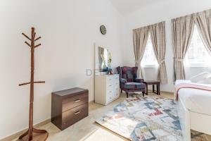 Community View 2BR With Private Balcony Near Golf Club, Sherlock House 2, Motor City by Deluxe Holiday Homes