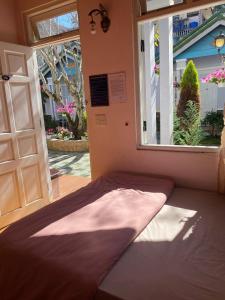 Nhà Nghỉ Sân Vườn Phượng Tím