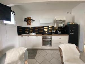 Maisons de vacances maison chaleureuse : photos des chambres