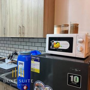 Aesthetic walking distance to MOA,near NAIA AIRPORT with NETFLIX,MINIVIDEOKE,BOARDGAMES-DUXE6