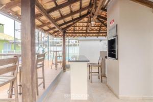 Prédio com piscina a 400m da Praia - LEA