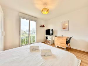 Appartements Le Sunset Beach - Parking - Fibre - Parc - Centre : photos des chambres