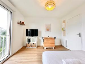Appartements Le Sunset Beach - Parking - Fibre - Parc - Centre : photos des chambres