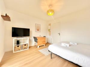 Appartements Le Sunset Beach - Parking - Fibre - Parc - Centre : photos des chambres