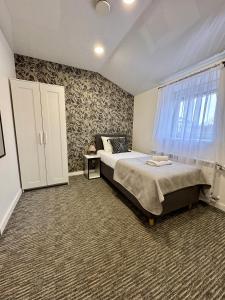 Grey apartments "Easy Kaunas"