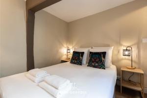 Appartements Emeraude Cozy Nest 3 Heart of Historic District 2 guests : photos des chambres