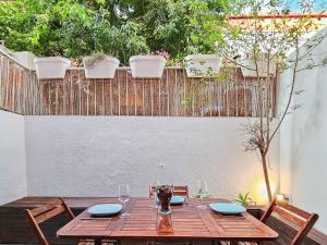 Ground floor apartment with private patio and AC