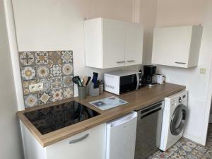 Appartements Le Boujou - Place de parking - 200m plage : photos des chambres