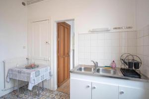 Appartements Le Boujou - Place de parking - 200m plage : photos des chambres