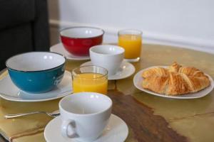 Appartements Le Boujou - Place de parking - 200m plage : photos des chambres