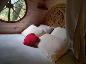 Tentes de luxe La roulotte du petit paradis : photos des chambres