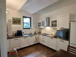 Casa per 9 con giardino vicino al Monte Amiata e alla Val dOrcia