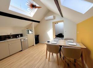 Appartements L-echapee verte Grand T3 avec climatisation : photos des chambres
