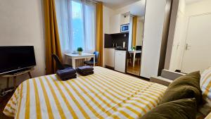 Appartements Studio Safran - 15min Paris, calme & cosy : photos des chambres