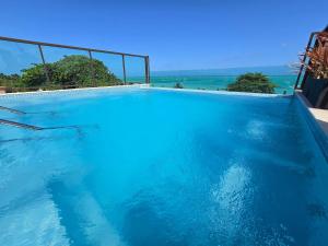 Apartamento bem equipado com vista do mar