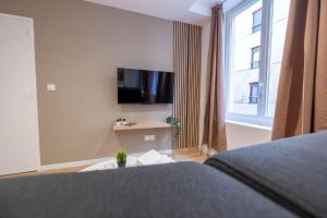 Appartements Neuf & cosy, Centre-Ville, Netflix : photos des chambres
