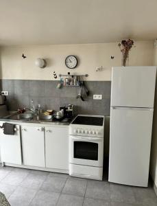 Maisons de vacances Petite maison calme dans un jardin : photos des chambres