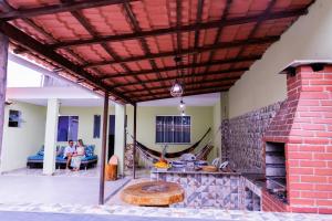 Casa em Cabo frio, com quintal privado e área gourmet