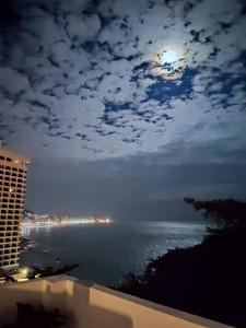 Quarto de frente para o mar