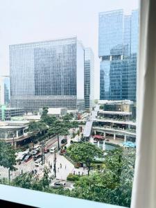 Cozi Family or business suite near Mitsukoshi BGC wifi pool