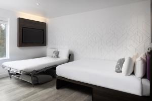 Larger Room with Double Bed and Sofa Bed room in The East London Hotel