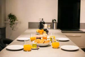 Appartements BnGo I Luxe & Confort I Lyon centre, 4 personnes, toilette separe, Place des terreaux : photos des chambres