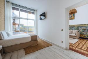 Apartamentos "El Escondite de Triana"