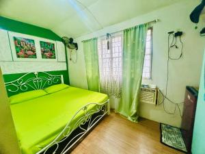 Montalban GuestHouse 1 AC Bedroom 200mbps FREE Netflix Parking Videoke Cook