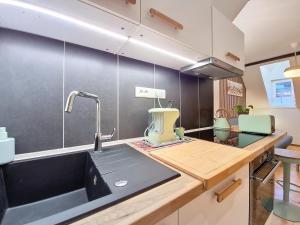 Appartements Chez Dame Coco - Entierement neuf - Confortable - Proche centre-ville : photos des chambres