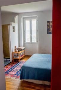 Maisons de vacances Village house surrounded by greenery : photos des chambres