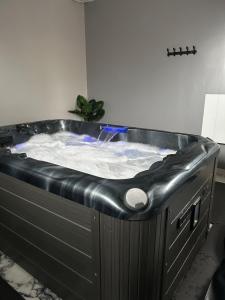 Maisons de vacances Gites Rozanna avec acces detente SPA JACUZZI : photos des chambres