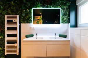 Appartements L'Oasis Tropicale, Jacuzzi, Love Room : photos des chambres
