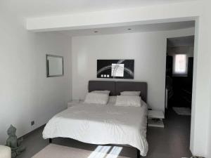 Villas Charmante maison avec piscine : photos des chambres