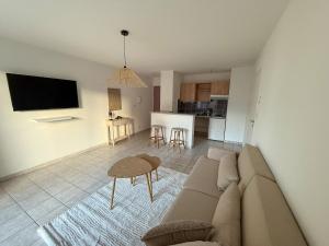 Appartements Cozy appartement avec terrasse et parking : photos des chambres
