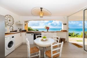 Mont Choisy Vue imprenable sur la mer et spa 2BDcanapé