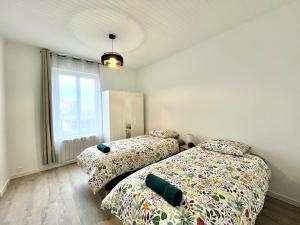 Maisons de vacances Maison de ville renovee a 15 min de Lyon : photos des chambres